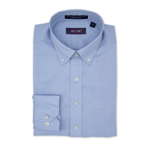 Light blue dress shirt with collar and button details on a white background