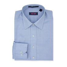 Load image into Gallery viewer, Folded light blue dress shirt with a visible brand label on a white background